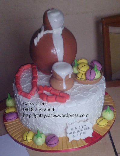 Traditional wedding cake with fondant accessories